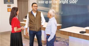 Sushil talking to group of people